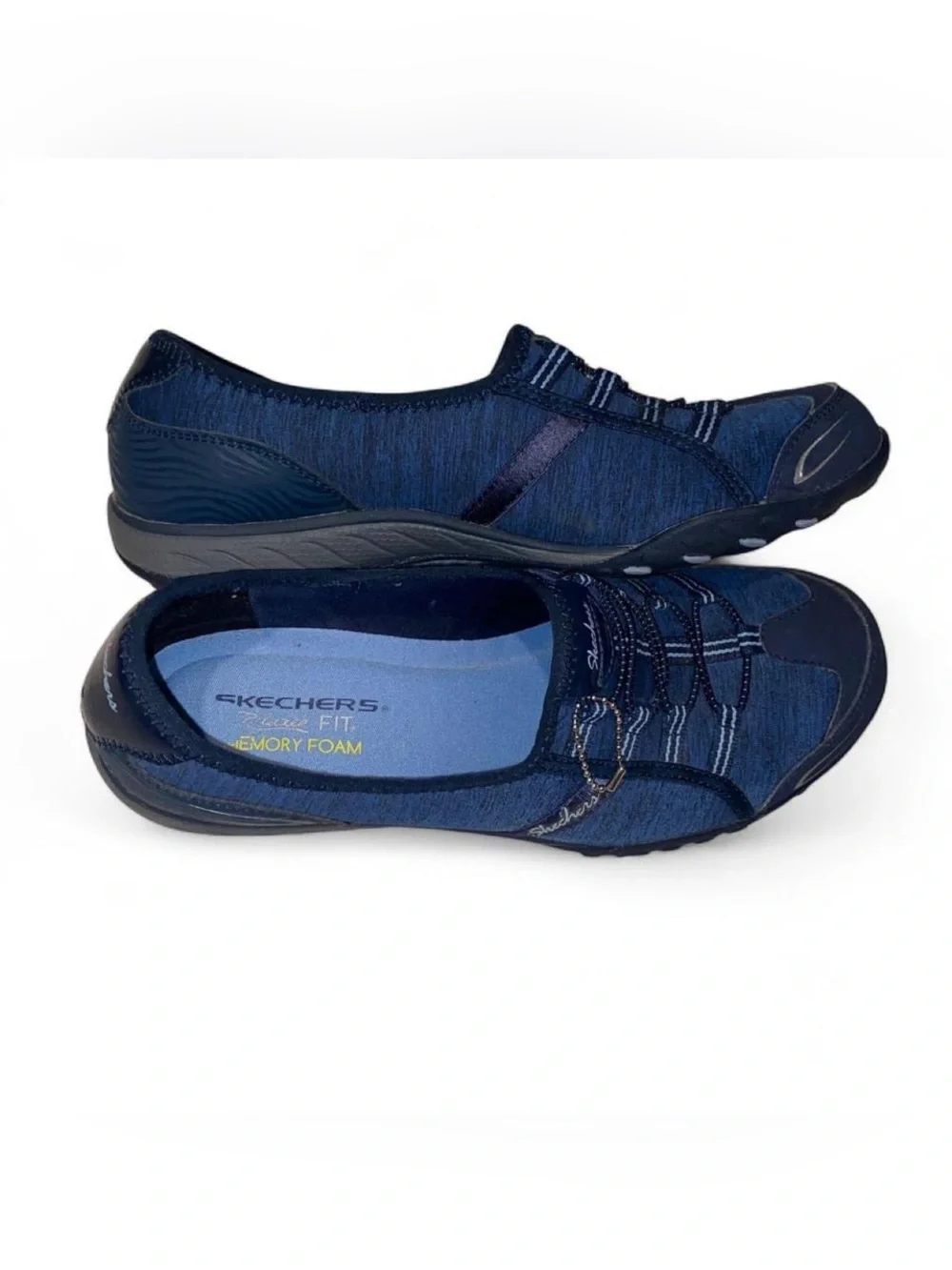 Skechers Woman’s Navy Slip-On Memory Foam Sneakers